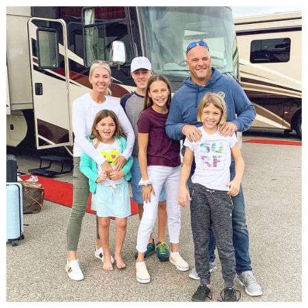 Sarah Baeumler, with her husband Bryan and her childrens. 